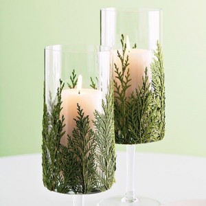 Christmas greenery in glass for decorating fireplace mantel