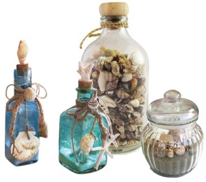 Fill apothecary jars and other glass containers with shells and or sand.