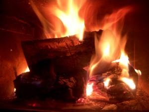 Hot roaring fire in the fireplace