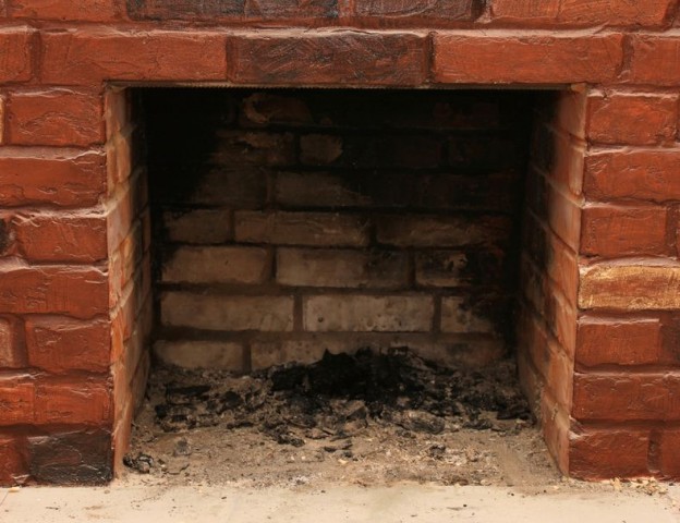 Cleaning a dirty fireplace
