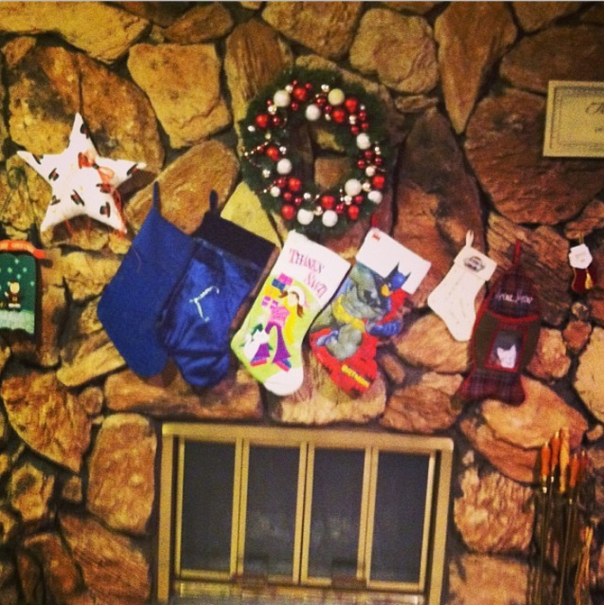 Each stocking on this stunning stone fireplace captures the individuality of each family member. 