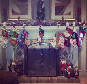 The grandkids' stockings all hang from the proud grandparent's fireplace mantel.