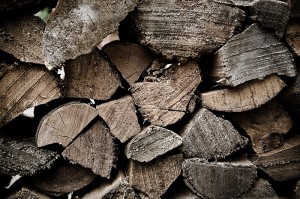 To build a fire, use dry, split hardwood that has seasoned at least 6 months.