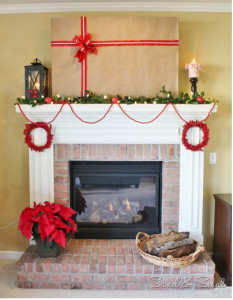 Hide fireplace TV for Christmas with a removable Christmas wrap.