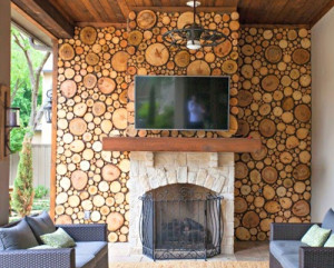 Wood Circles as inexpensive Way to Decorate Fireplace Wall